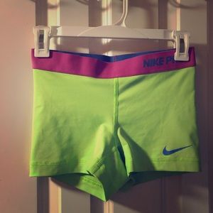 Lime green Nike pros